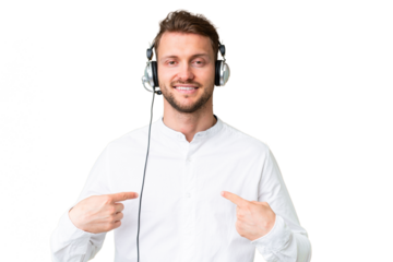 Telemarketer caucasian man working with a headset over isolated chroma key background proud and self-satisfied