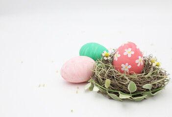 Nest with colorful Easter eggs