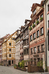 Fototapeta na wymiar Traditional European old town buildings. Old historic architecture in Nuremberg, Germany