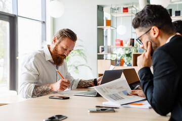 Fototapeta premium Group of multiethnic businesspeople working together in office