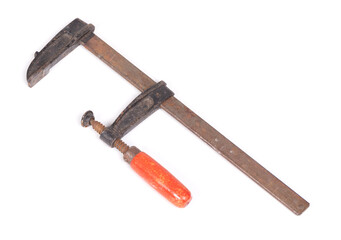 Big old metal clamp or Joiner clamp wood tools, isolated