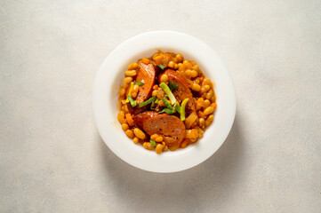 Beans with sausage and tomato sauce. Beans stew, homemade rustic english food.
