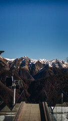 Snowy mountains against a blue sky