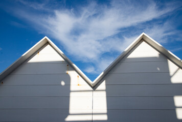 white  empty beach huts in Procida