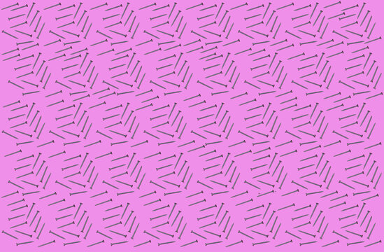 Pattern of rows of screws flat laid against pink background