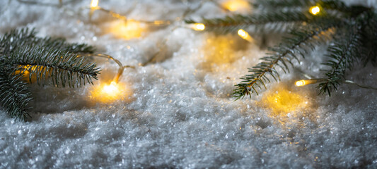 christmas string lights in snow