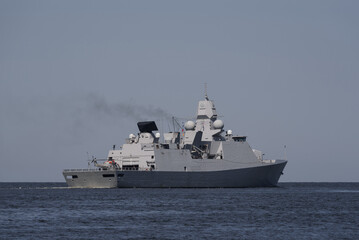 Fototapeta na wymiar WARSHIP - Modern guided missile frigate is sailing on the sea
