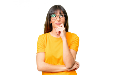 Young caucasian woman over isolated chroma key background thinking an idea while looking up