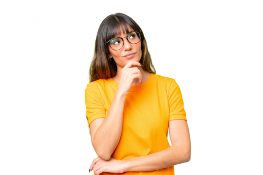 Young caucasian woman over isolated chroma key background and looking up