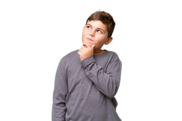 Little caucasian kid over isolated chroma key background and looking up