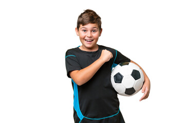 Little caucasian football player kid over isolated chroma key background celebrating a victory