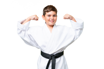 Little caucasian kid over isolated chroma key background doing karate and making strong gesture