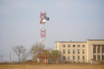 scaffolding with antennas on a blue background