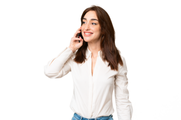 Young caucasian woman over isolated chroma key background keeping a conversation with the mobile phone