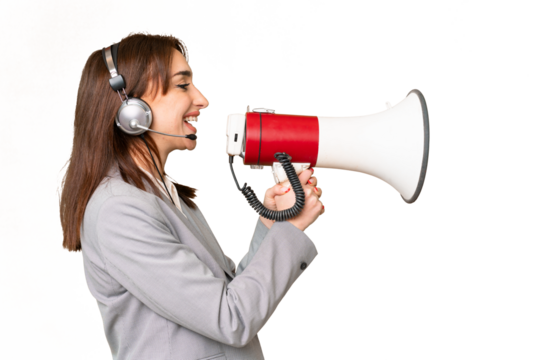 Telemarketer caucasian woman working with a headset over isolated chroma key background shouting through a megaphone