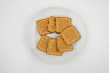 cookies in a white plate on white