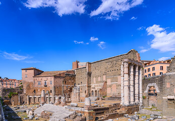 Fototapeta na wymiar Forum of Augustus in Rome, Italy: view of the ruins of Temple of Mars Ultor (Mars the Avenger).