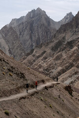 People hiking in the rocky mountains of ladakh. India's rugged little Himalayas