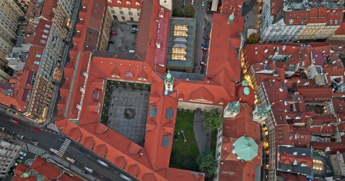 Prague Czechia Aerial v33 hyper-lapse vertical birds eye view flyover old town square capturing bustling historic downtown with speed up traffics motion at dusk - Shot with Mavic 3 Cine - October 2022