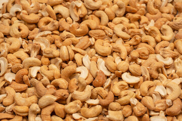 A group of almonds, pistachios, walnuts, macadamia, cashews.