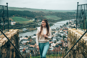 Girl looking over the Moselle valley of Luxembourg