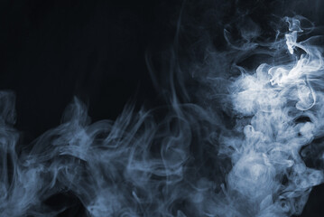 Yellow steam on a black background.