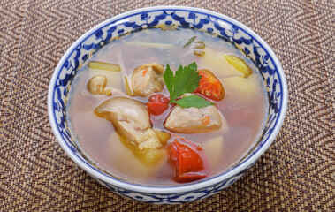 Potatoes Soup With Chicken on the wooden table