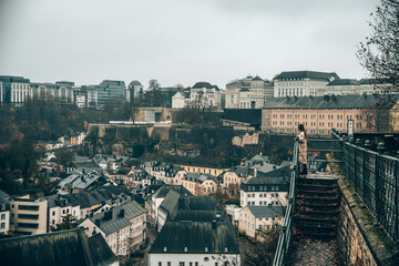Girl looking at the panorama over the beautiful city of Luxembourg in Europe