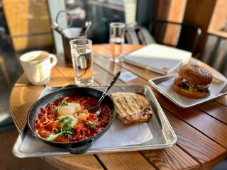 shakshuka in restaurant and burger