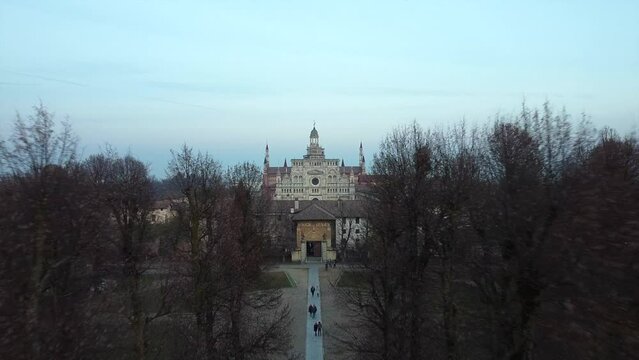 Europe, Italy , Pavia 2022 - Certosa di Pavia is a religious monastery of Carthusian friars near Milan - founded by Visconti family - drone aerial view