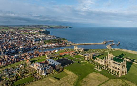 Whitby, Yorkshire, England. Aerial view of Whitby in North Yorkshire. Harbour and Abbey overlooking the town near the famous 199 steps to the Dracula church 