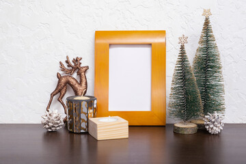 Mock up wooden frame with Christmas New Year decorations still life. Xmas text blank