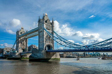 Fototapeta na wymiar The Tower Bridge and the river Thames on a sunny day in London, UK