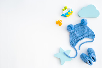 Baby boy blue hat with booties and accessories, top view