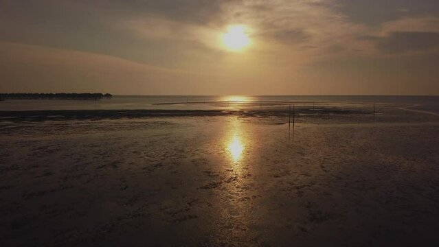 Drone Shot of Bagan Lalang beach at sunset time. Ocean and sea stock videos.