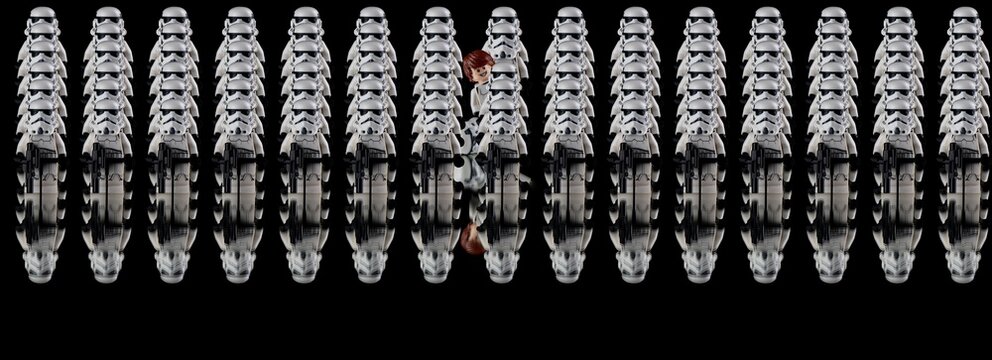 Lego stormtroopers lined up with one goofball