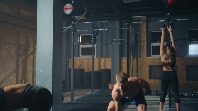 jock is training in gym, lifting dumbbell, powerlifting workout of professional sportsman