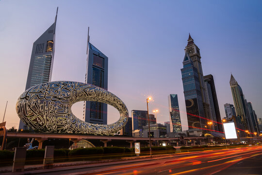 Dubai, United Arab Emirates - November 21, 2022; Main road of Dubai, Shekh Zayed road. Famous building of Museum of future in night illumination