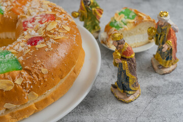 typical dessert of the day of kings in Spain, delicious and colorful With figurines of the Magi