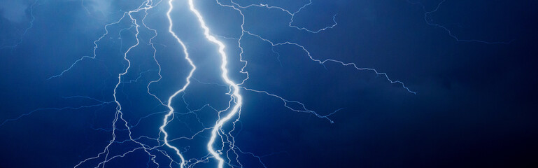 Thunder, lightnings and rain on stormy summer night	