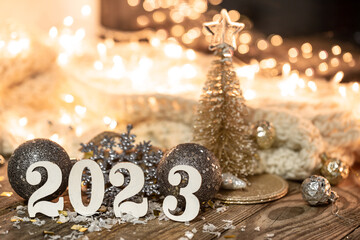 Christmas background with numbers 2023 and decor details.