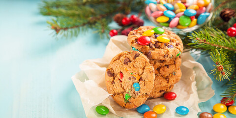 Christmas  cookies with a multicolor dragee on a table. Copy space