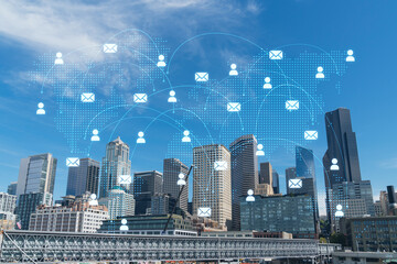 Seattle skyline with waterfront view. Skyscrapers of financial downtown at day time, Washington, USA. Social media hologram. Concept of networking and establishing new people connections