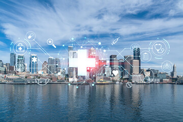 Seattle skyline with waterfront view. Skyscrapers of financial downtown at day time, Washington, USA. Health care digital medicine hologram. The concept of treatment and disease prevention