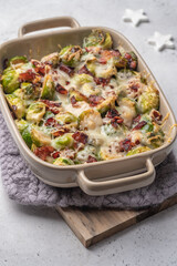 Baked brussel sprout casserole with a bacon and cheese