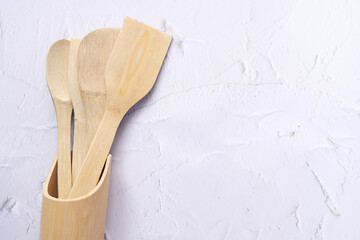  wooden cutlery fork and spoon on white background 