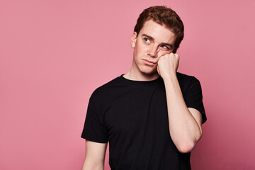 Bored young male looking away