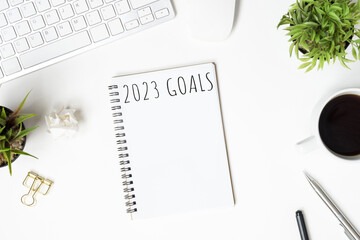 Notebook with 2023 goals text on it to apply new year resolutions and plan.