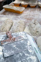 Bakery counter with special raw breads to be baked