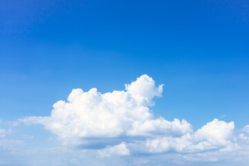 Naklejka na ściany i meble Clouds in the blue sky. Natural sky background texture, beautiful color. Peaceful blue sky with light clouds. The free form beauty of clouds and sky is perfect for background, backdrop and wallpaper.